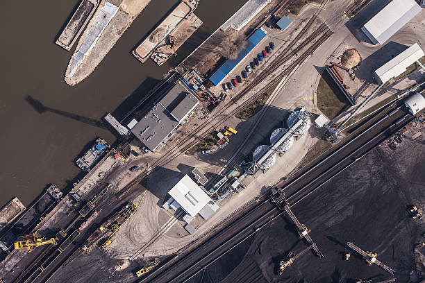 istock moving crane with a heap of coal 501814180