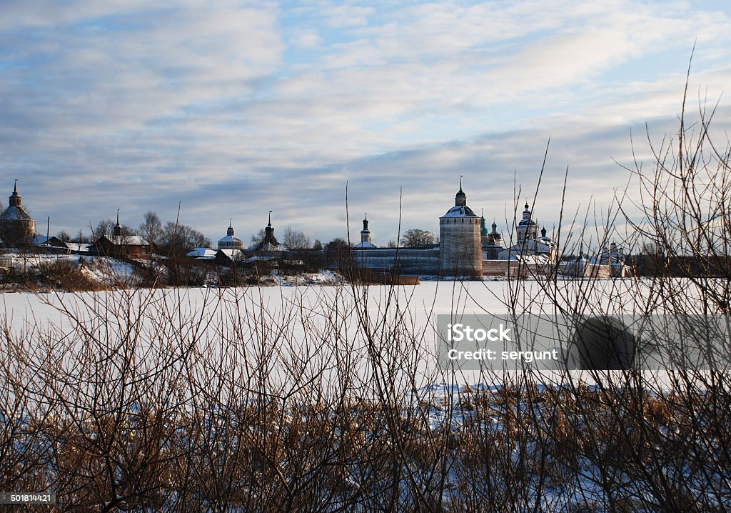 Northern Russian monastery in winter. Photo of the Kirillo-Belozersky monastery in a winter landscape at sunset. Vologda region, Russia. Architectural Dome Stock Photo