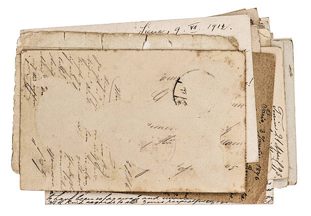 istock pile of antique postcards isolated on white 501815851