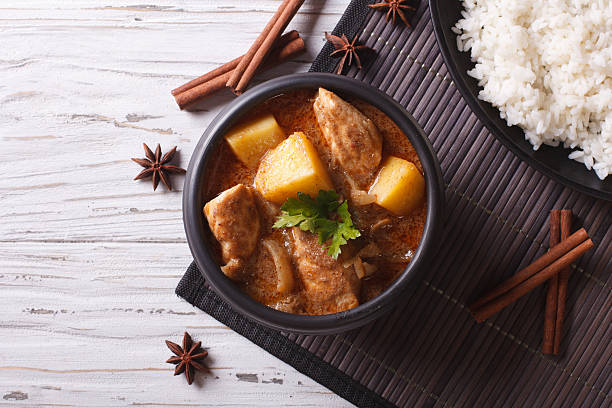 istock Thai massaman curry with chicken and rice. horizontal top view 501819320