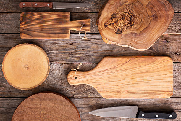 istock Wooden background with cutting boards 501820370