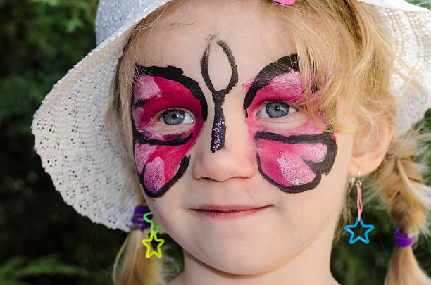 istock child with face painting 501820411