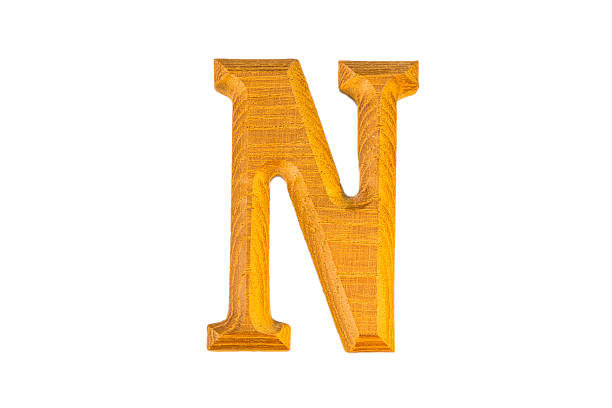 istock N Alphabet made from golden teak 501820770