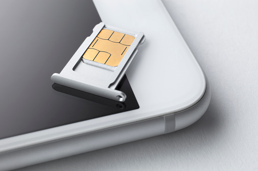 Cell phone sim card and sim card tray.