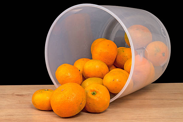 istock Frustrate bucket of bad mandarins 501821574