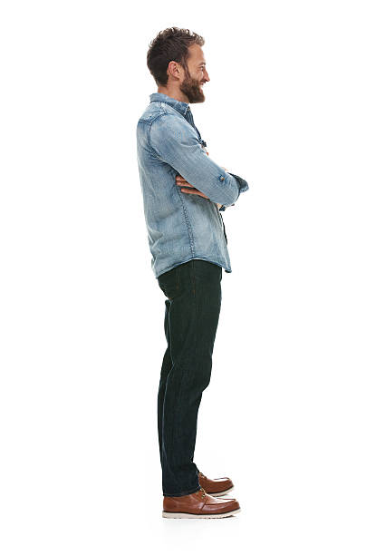 istock Smiling casual man standing with arms crossed 501822180