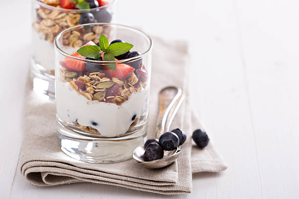 istock Granola with fresh berries in a blue bowl 501822220