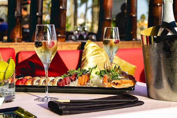 istock Luxury restaurant table with sushi and champagne bottle 501823628