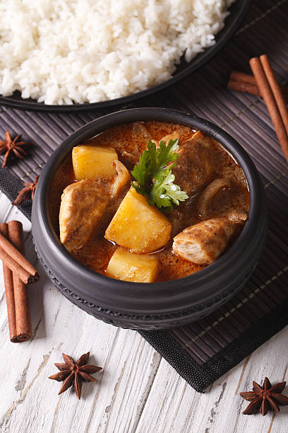 istock Thai massaman curry with chicken in bowl and rice 501825502