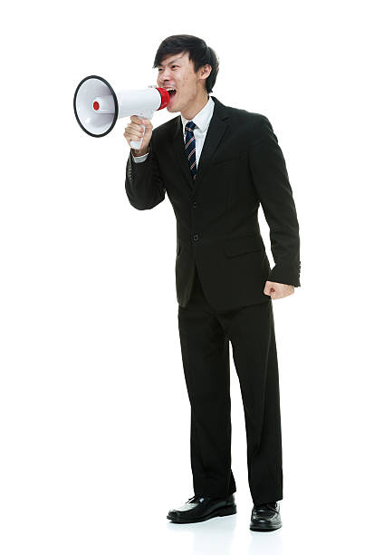 istock Excited businessman shouting with megaphone 501826046