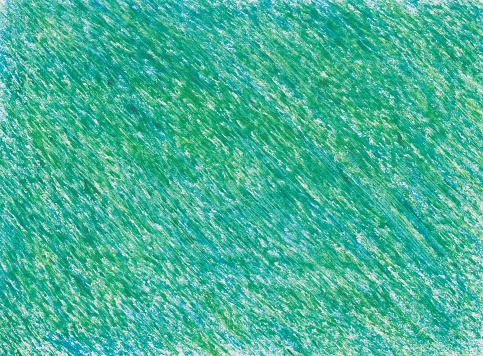 The vivid intense green color crayon textures abstract background.
