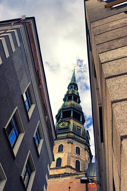 istock Peter's Cathedral in Riga between buildings 501830039