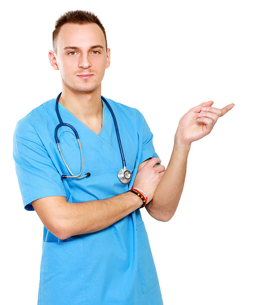 istock male doctor pointing something interesting, isolated on white background 501830801
