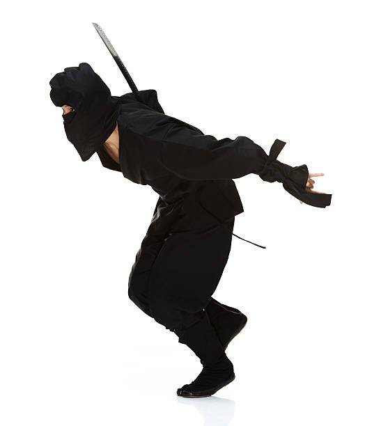 istock Side view of ninja running with sword 501831411