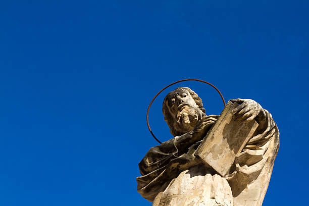 istock Religious Statue of an Apostle Against Deep Blue Sky, Sicily 501833317