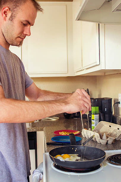 Cooking Eggs stock photo