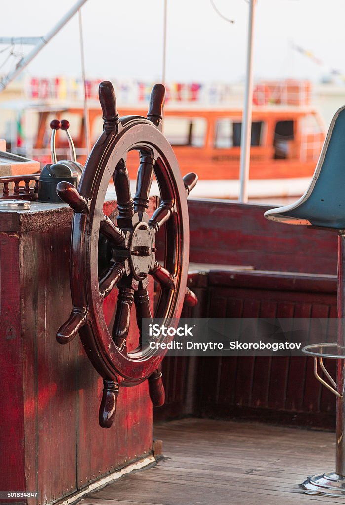 ship wheel ship wheel brown shiny wood Ancient Stock Photo