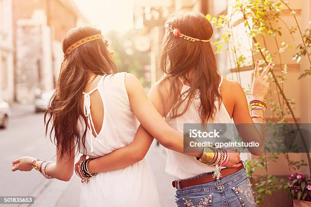 Boho Girls Walking In The City Stock Photo - Download Image Now - Adult, Adults Only, Alley