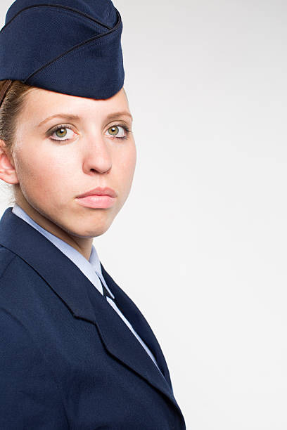 istock one female US air force senior airman on white background 501836467