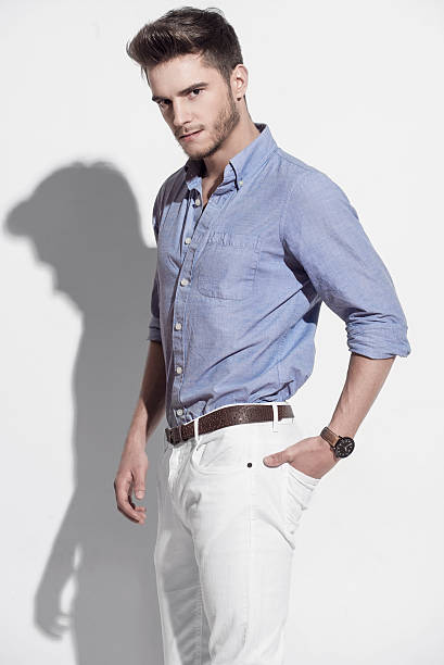 istock Handsome man in bright blue shirt 501843442