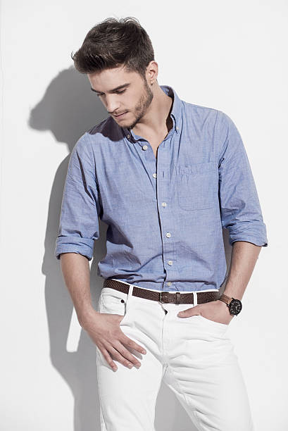 istock Handsome man in bright blue shirt 501843486