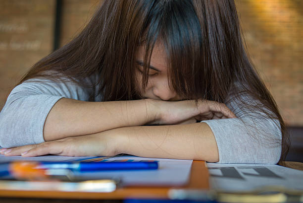 istock Young Asian employee feels tired and frustrated at work 501844414