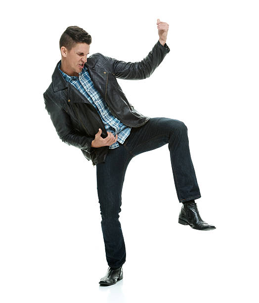 istock Excited man playing air guitar 501845814