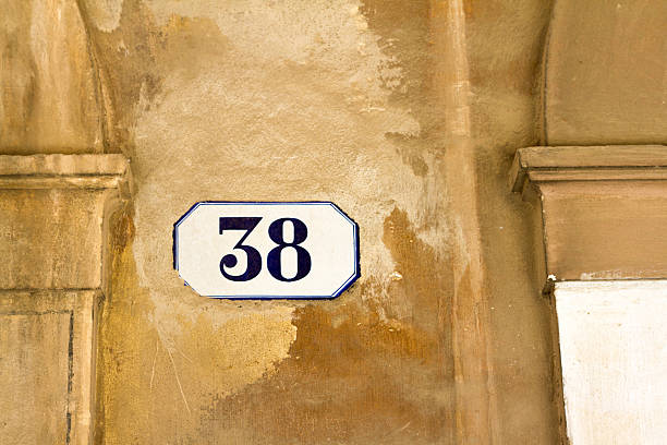 istock Number 38 Street Address Tile On Mottled Old Italian Wall 501847220