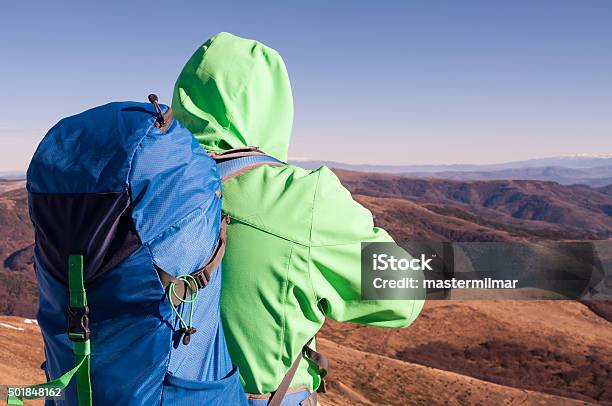 Hiker Looking At The Mountain Scenery Stock Photo - Download Image Now - 2015, 30-34 Years, 35-39 Years