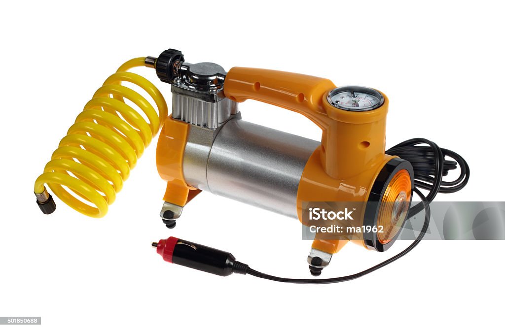Car air compressor Car air compressor with yellow twisted hose  isolated on a white background Air Compressor Stock Photo