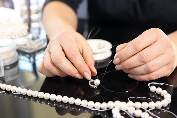 istock Creating jewelry with pearls 501851376