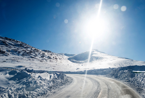 Mountain road in wineter with snow.