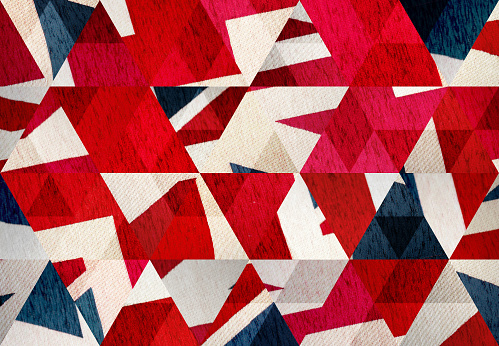 Abstract triangle shaped background: United Kingdom flag close up