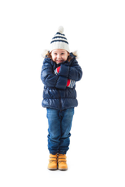 istock Cute girl wearing winter clothes with hat posing 501852330