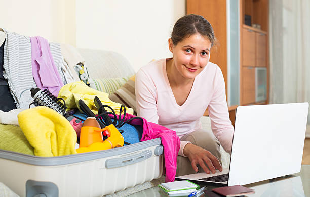 istock Woman preparing for travel 501854350