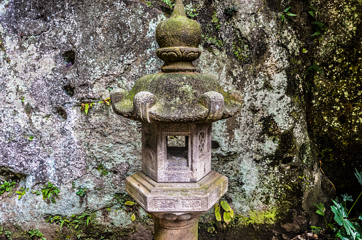 Japanese Stone Lantern Covered in Moss