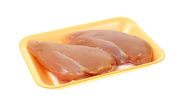 istock Fresh chicken breast in yellow tray 501864745
