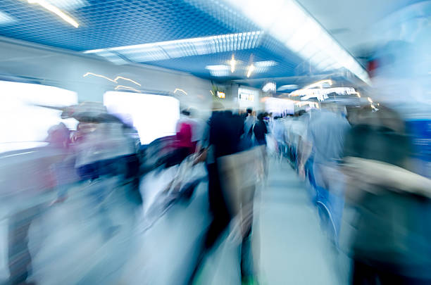 istock group of blur passengers, walking at subway station. 501866177