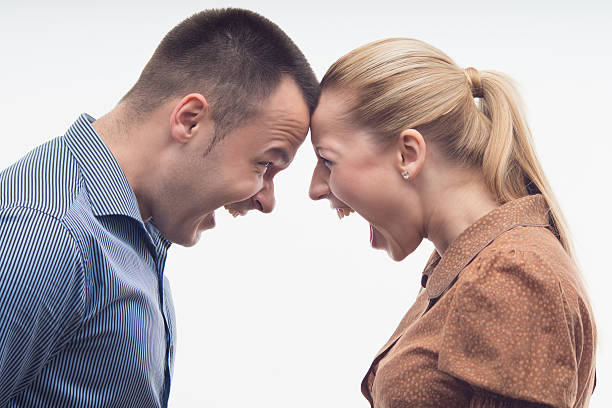 istock Colleagues fighting each other with foreheads together 501866671