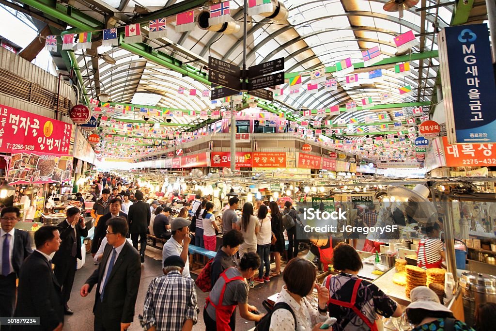 Gwangjang Market The famous Gwangjang Market in Seoul, South Korea. Thousands of people, vendors, and amazing street food. Seoul Stock Photo