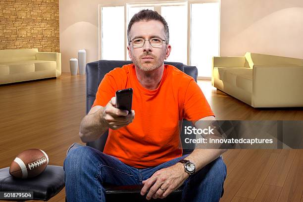 Man Watching Football On Tv Stock Photo - Download Image Now - American Football - Ball, American Football - Sport, Front View