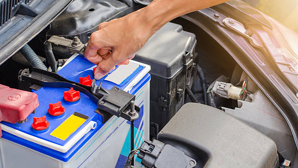 istock Open cap of battery for add distilled water by hand 501885032