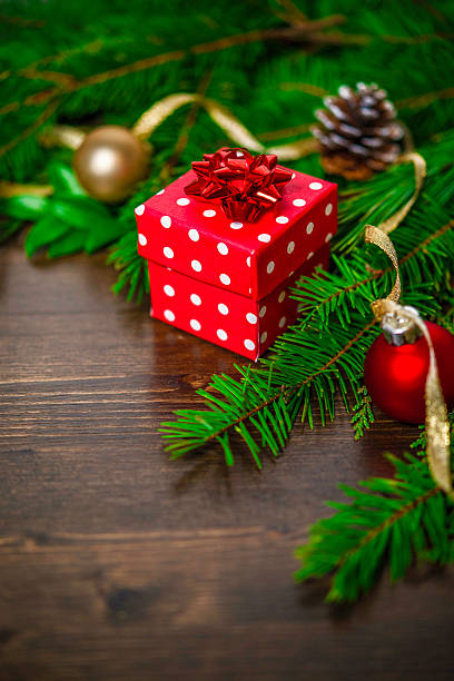 istock Rustic Christmas arrangement with baubles, pincecones and Christmas gift 501886168