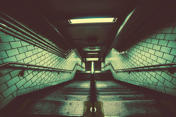 istock Radioactive green public staircase tunnel. 501886286