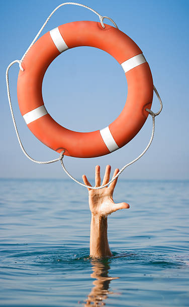 istock Lifebuoy for man in danger. Rescue situation concept 501887918