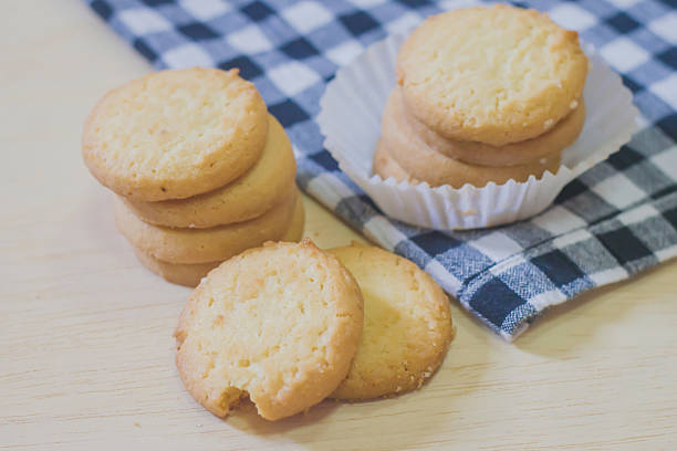 istock cookies on wood texture 501888798