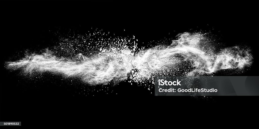 Exploding white powder Abstract exploding white powder line isolated on black background. Talcum Powder Stock Photo