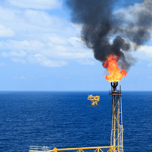 istock Hot flare boom and fire on offshore production platform 501892456