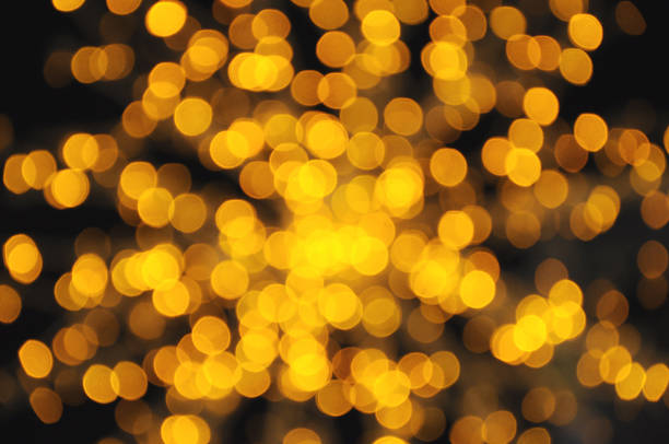 istock Abstract background with bokeh defocused gold decorated lights i 501893518