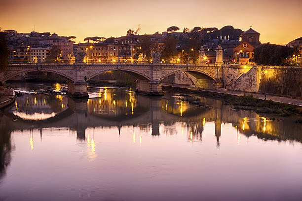 istock Rome bridge with Tiber river view at dusk 501905220